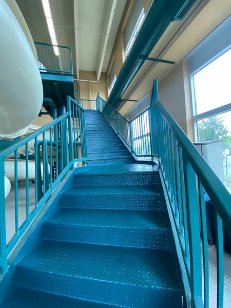 Industrial interior painting inside a facility